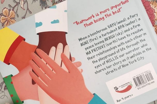 The back cover of I Am The Best, showing four hands stacked together