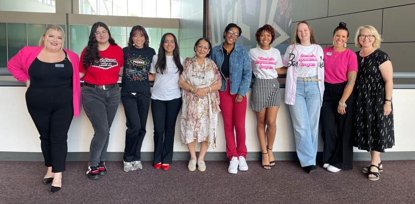 A Warrior Queen Project student cohort lined up in a lecture theatre